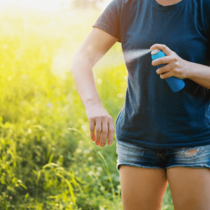 Spraying arm with insect repellent