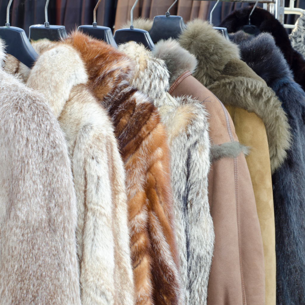 Fur coats on rail